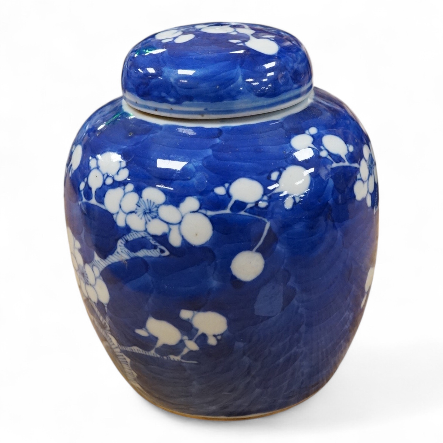 A 19th century Chinese blue and white prunus jar and cover, 15cm high
